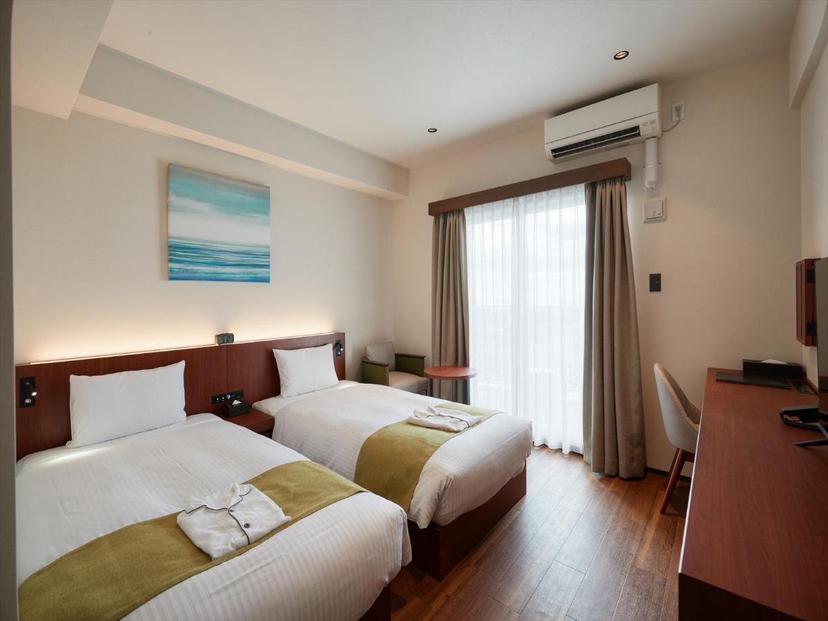The Grand Hotel Ginowan Exterior foto